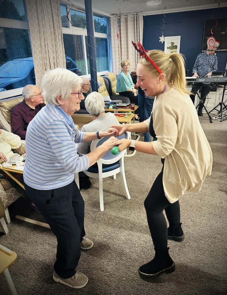 dancing to festive tunes at the care home