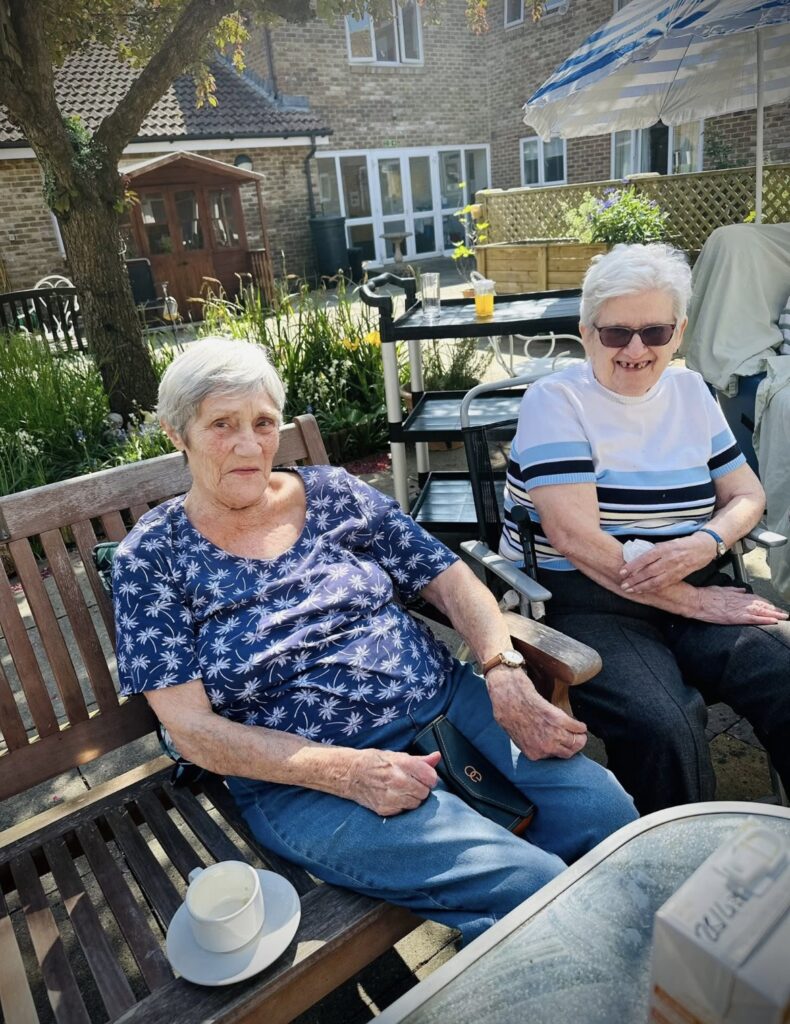 afternoon tea in the sun with residents