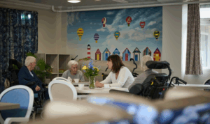 adult child visiting elderly parent